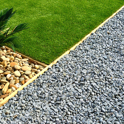 Landscaping combinations of grass, plant and stones