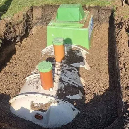 sewage treatment plant gravity outlet being installed in ground