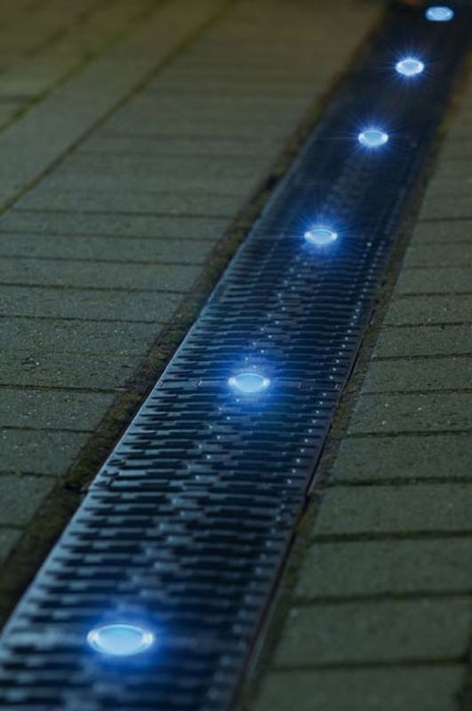 ACO channel drain with LED lights at night